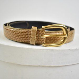Genuine snake skin belt.